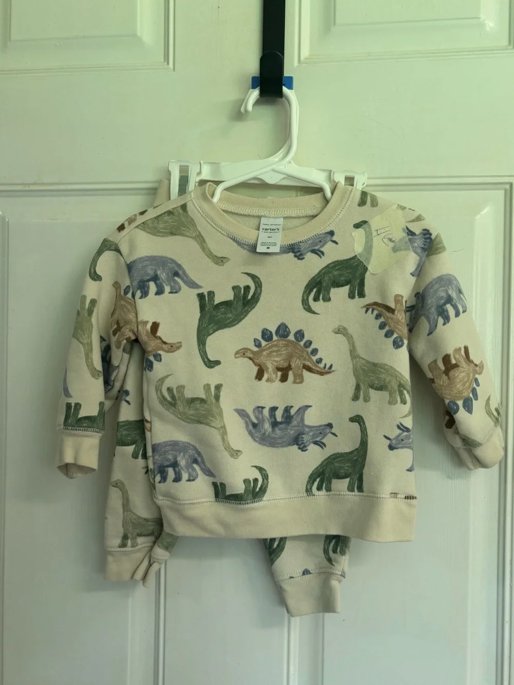 18M Carter's cream/Multicolored Dinosaur sweatshirt and sweatpants set.  In VGUC